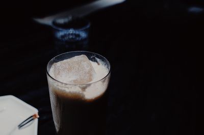 Close-up of coffee cup on table