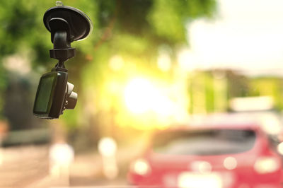 Close-up of camera against blurred background