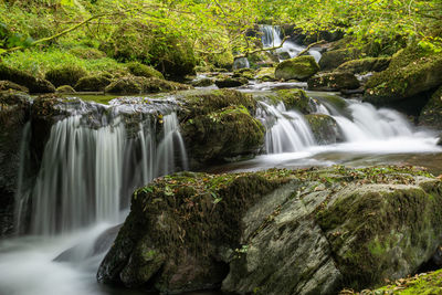 Long exposure of a waterfall on the hoar oak water river at watersmeet in exmoor national park