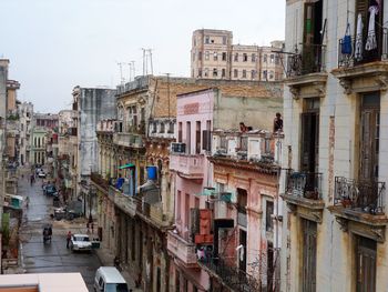 Buildings in city against sky