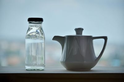 Close-up of glass jar on table