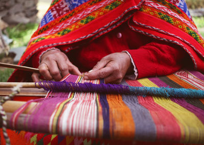 Close-up of woman weaving