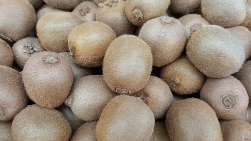 Full frame shot of kiwis for sale at market