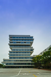 Low angle view of building against blue sky