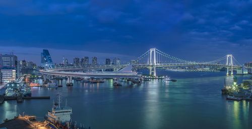 Circular highway leading to the rainbow bridge in odaiba bay of tokyo.