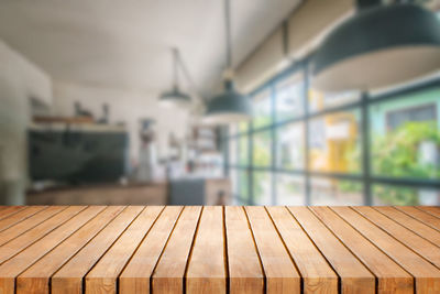 Close-up of wooden table at home