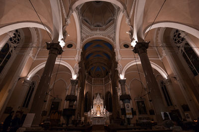 Low angle view of illuminated ceiling