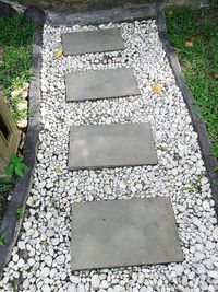 Close-up of stone on grass