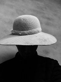 Close-up of man wearing hat