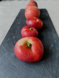 High angle view of peaches on table