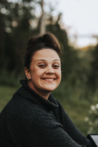 Smiling woman looking at camera