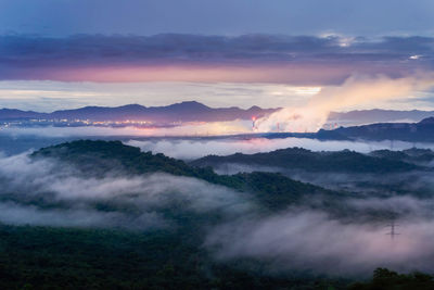 Scenic view of mountains against sky during sunset