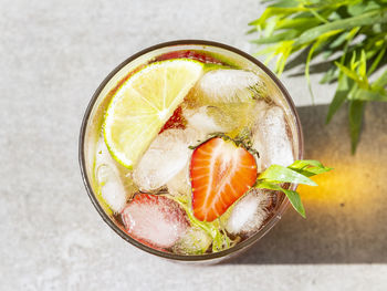 Directly above shot of fruits in glass on table
