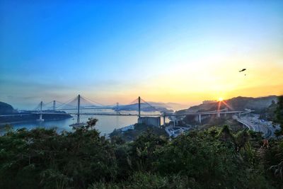 View of suspension bridge in city