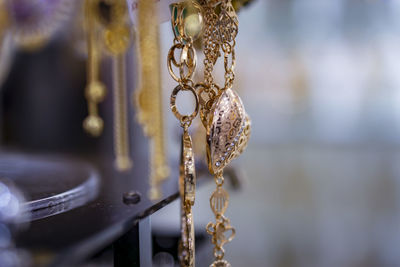 Close-up of chain hanging on metal