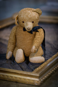 Close-up of teddy bear on table