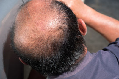 Close-up of man with dog