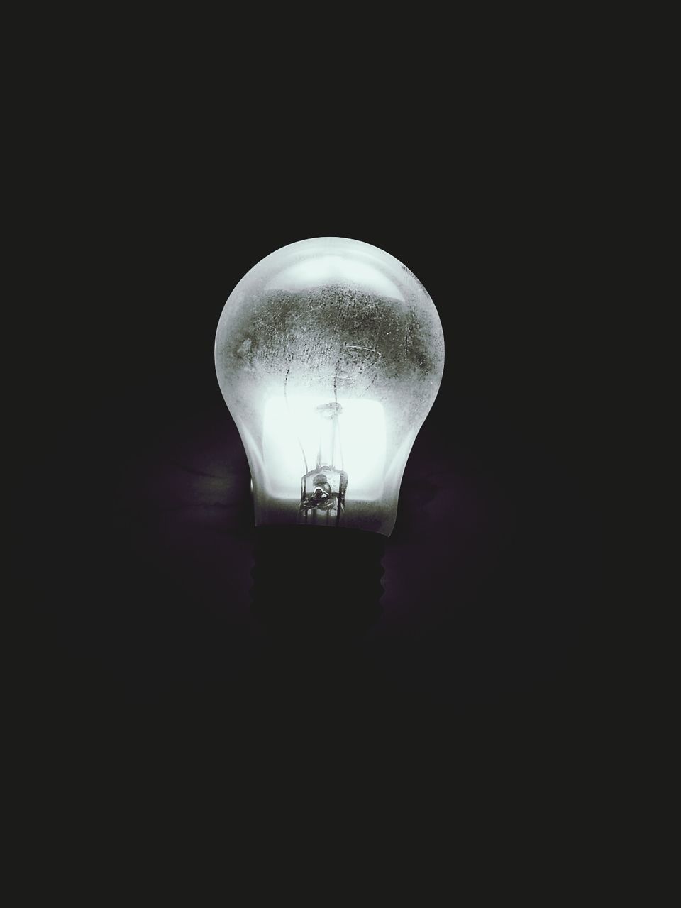 illuminated, lighting equipment, electricity, indoors, light bulb, electric light, glowing, electric lamp, copy space, low angle view, lit, hanging, dark, ceiling, night, fuel and power generation, lamp, light - natural phenomenon, close-up, darkroom