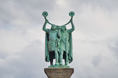 Copenaghen city  hall square horn players statue