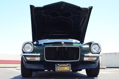 Vintage car against clear blue sky