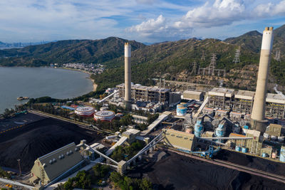 High angle view of road by buildings in city