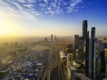 Cityscape against sky during sunset