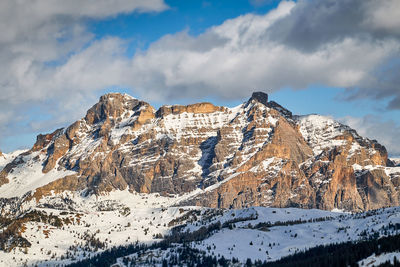 Typical rugged orange-yellow mountain formations of the italian dolomites in south tyrol
