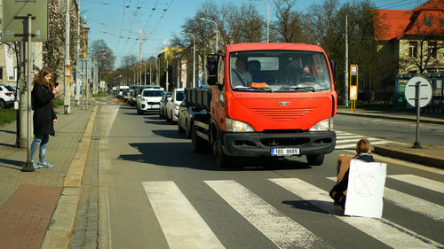 Cars on road in city