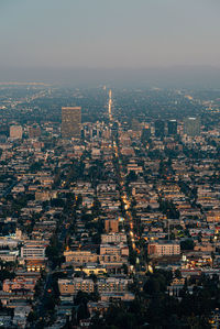 High angle view of city buildings against sky