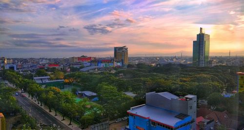 High angle view of buildings against sky during sunset