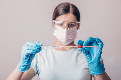 Portrait of woman wearing mask