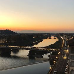 High angle view of bridge over river at sunset