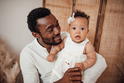 Portrait of father with son