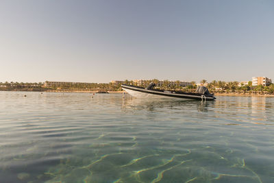 Scenic view of river against clear sky