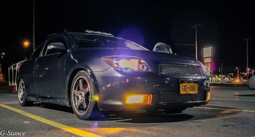 Cars on road at night