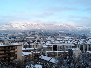 High angle view of townscape against sky during winter