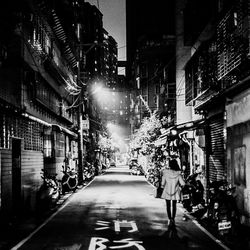 Illuminated buildings in city at night