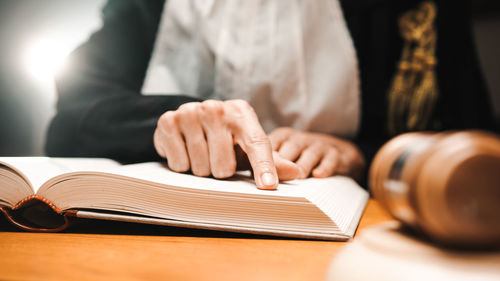 Lawyer reads a book before the sentence