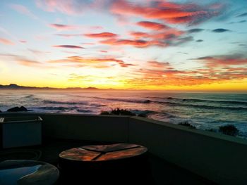 Scenic view of sea against sky at sunset