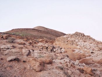 Scenic view of desert against clear sky