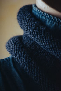 Close-up of person relaxing in snow