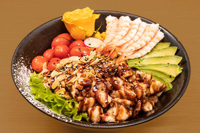 High angle view of food in plate on white background