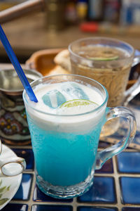 Close-up of drink served on table