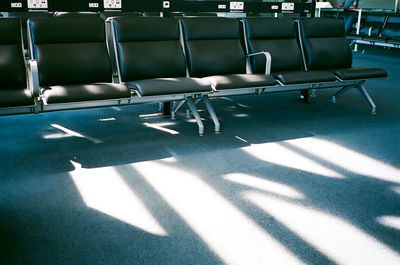 High angle view of chairs on table