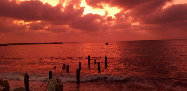 Scenic view of sea against sky during sunset