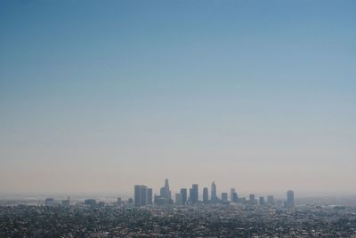 View of cityscape against clear sky