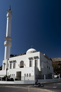 View of building against clear blue sky