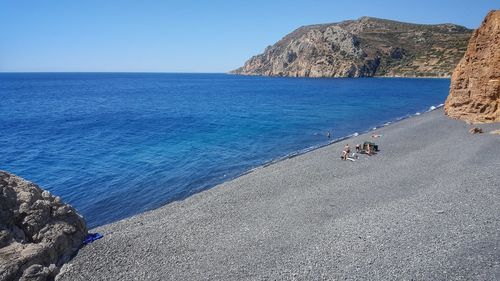Scenic view of sea against blue sky