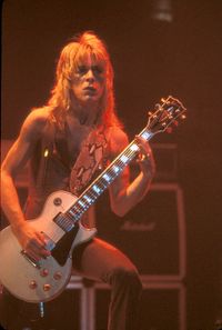 Woman playing guitar