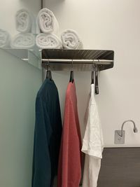 Clothes hanging on rack at home